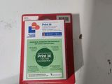 a picture of a red plastic box with a label on it