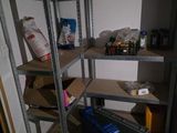a shelf that has many items on it in the room