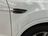 a close up of a car ' s door handle and door handle
