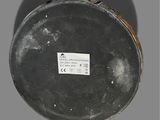 a close up view of a metal object with a label on it