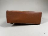 an image of a brown leather wallet on a white background