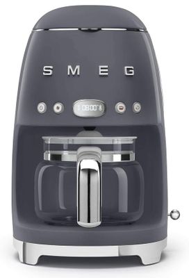 Lot d’une cafetière smeg et d’un grille pain moulinex