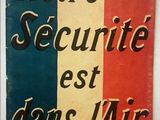 a close up of a book on a table with a red, white and blue cover