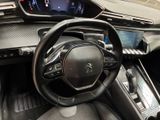 a picture of a car dashboard with a steering wheel
