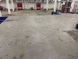 an image of a large warehouse with a lot of flooring