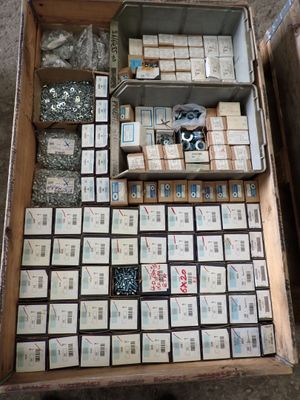 a box full of assorted items sitting on the floor