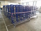 a large metal rack with a bunch of items on top of it