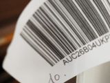 a close up of a bar code on a computer keyboard
