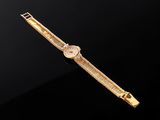 an 18k gold ladies ' s wrist watch