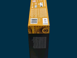 a yellow box that is sitting on top of a black table