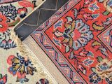 an image of a rug with a piece of fabric on top of it