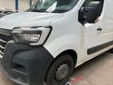a white van that is parked in a parking lot