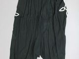 black shorts with white draws on the side and a white draws on the side