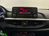 a car dashboard with a digital clock on it