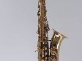 a close up of a saxophone on a white background