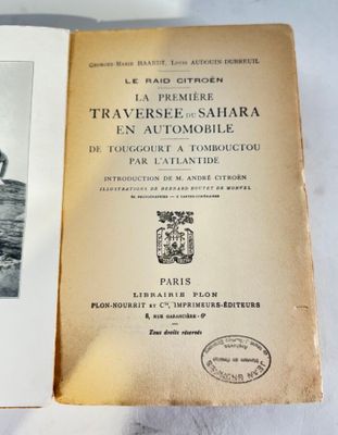 an old book with a picture of a man riding a horse