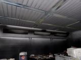 an image of a kitchen with a lot of food inside of it