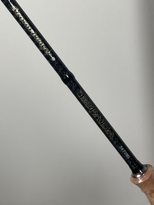 a baseball bat that is being held up by a person