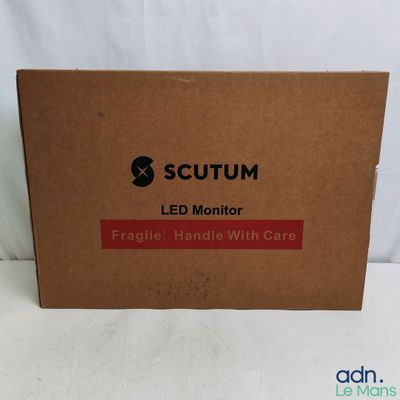 a brown box with a light on it sitting on a white surface