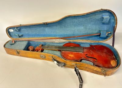 a violin in a case with a bow in it
