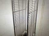 an image of a metal pan rack in a bathroom