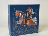 an image of a blue box with a picture of a man riding a horse