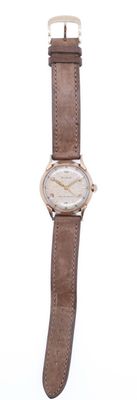 wrist watch with brown leather strap and white dial on white background