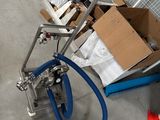 a cart with a bunch of boxes on it in a garage