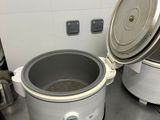 a crock pot sitting on top of a counter in a kitchen