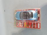 a toy car that is sitting on top of a box
