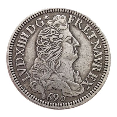 une pièce de monnaie en argent portant un visage de femme