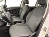 two seats in the back of a car with a steering wheel
