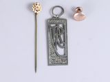 a close up of a metal object with a flower on it