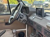 a car dashboard with a cell phone on the dashboard