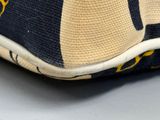 an image of a close up of a pillow with a cat on it