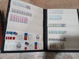 a black folder with stamps on it sitting on a table