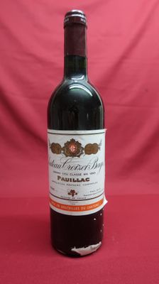 a bottle of wine that is sitting on a table