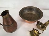 three different items that are on a white table