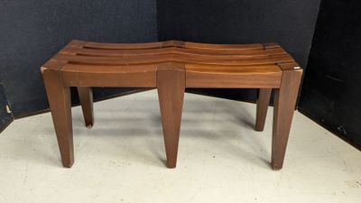 an image of a set of three wooden stools