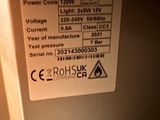 a label on the back of a machine that is not working