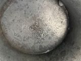 a metal object that is sitting on the ground