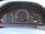 a close up of a car dashboard with a speedometer