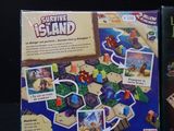two board games on the table, one of which is a pirate ' s island and the other of which is a pirate ' s island