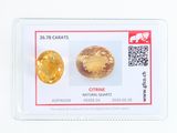 deux saphirs jaunes sur une carte blanche avec un code QR
