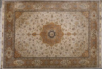 une image représentant un tapis orné d'un motif en médaillon