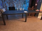 a table that has a book on it in a room