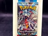 a box of pokemon trading cards with a picture of a pokemon character on it
