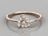 a rose gold engagement ring with diamonds on top