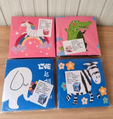 four children ' s books with pictures of animals and animals on them