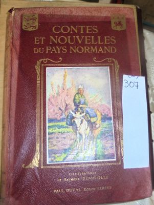 un livre rouge sur lequel figure l'image d'un homme à cheval